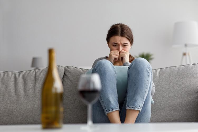 why do i sneeze when i drink alcohol